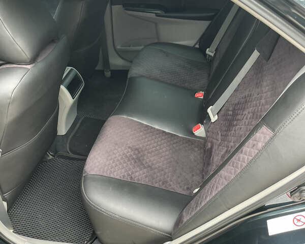 Черный Тойота Камри, объемом двигателя 2.5 л и пробегом 250 тыс. км за 10900 $, фото 11 на Automoto.ua
