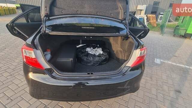 Черный Тойота Камри, объемом двигателя 2.49 л и пробегом 255 тыс. км за 13400 $, фото 17 на Automoto.ua