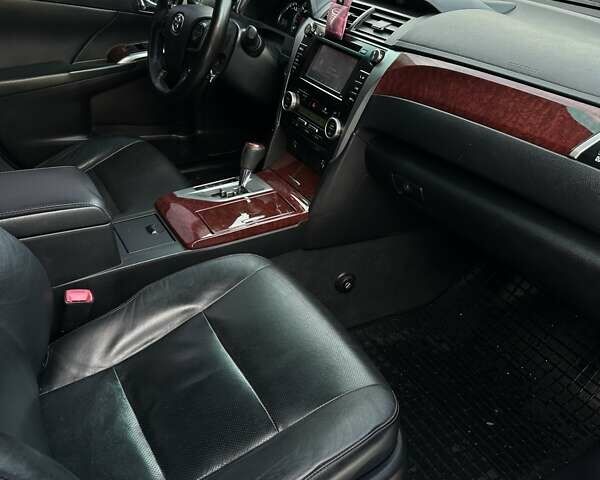 Черный Тойота Камри, объемом двигателя 2.5 л и пробегом 283 тыс. км за 11800 $, фото 22 на Automoto.ua