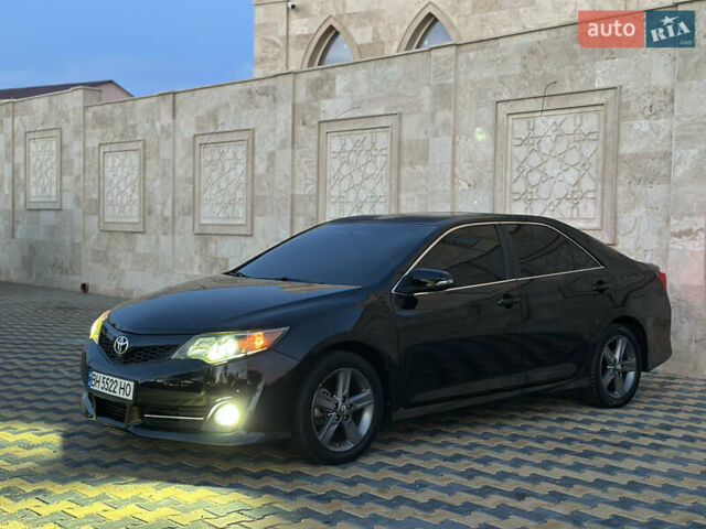 Черный Тойота Камри, объемом двигателя 2.5 л и пробегом 215 тыс. км за 11950 $, фото 23 на Automoto.ua