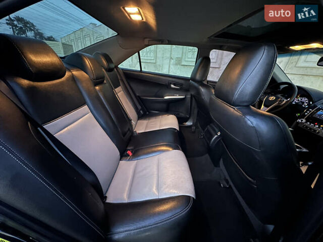 Черный Тойота Камри, объемом двигателя 2.5 л и пробегом 215 тыс. км за 11950 $, фото 30 на Automoto.ua