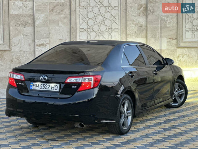 Черный Тойота Камри, объемом двигателя 2.5 л и пробегом 215 тыс. км за 11950 $, фото 3 на Automoto.ua