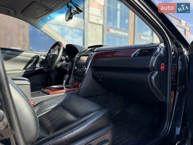 Чорний Тойота Камрі, об'ємом двигуна 2.49 л та пробігом 305 тис. км за 11800 $, фото 13 на Automoto.ua