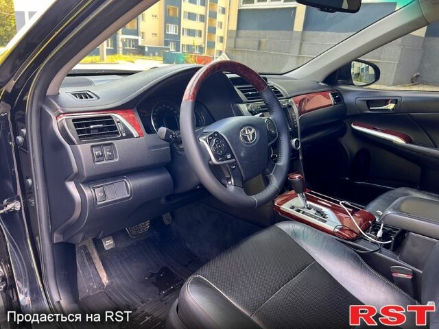 Чорний Тойота Камрі, об'ємом двигуна 2.5 л та пробігом 250 тис. км за 13500 $, фото 6 на Automoto.ua