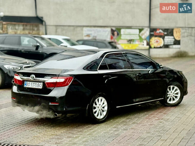 Чорний Тойота Камрі, об'ємом двигуна 2.5 л та пробігом 251 тис. км за 10999 $, фото 27 на Automoto.ua