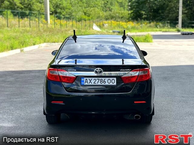 Чорний Тойота Камрі, об'ємом двигуна 2.5 л та пробігом 250 тис. км за 13500 $, фото 4 на Automoto.ua