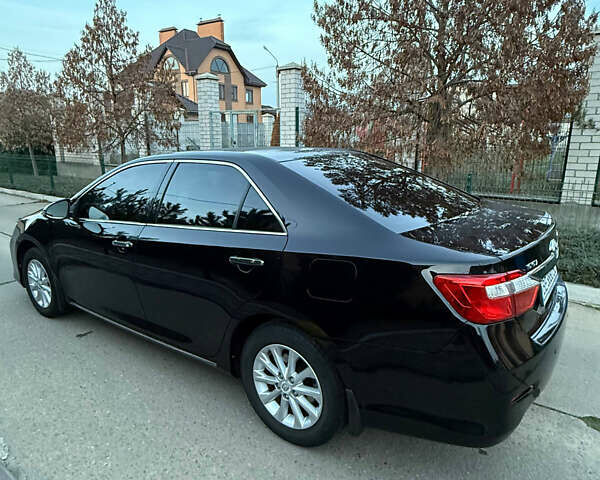 Черный Тойота Камри, объемом двигателя 2.5 л и пробегом 173 тыс. км за 13350 $, фото 8 на Automoto.ua