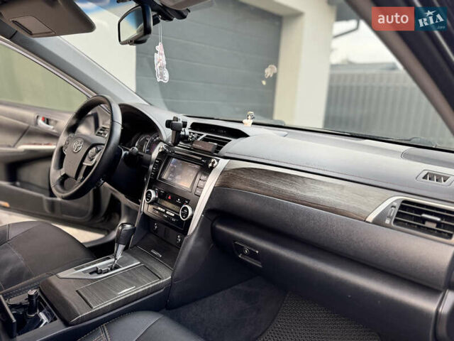 Черный Тойота Камри, объемом двигателя 2.5 л и пробегом 255 тыс. км за 13500 $, фото 30 на Automoto.ua