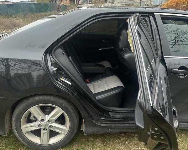 Чорний Тойота Камрі, об'ємом двигуна 2.5 л та пробігом 184 тис. км за 11111 $, фото 5 на Automoto.ua