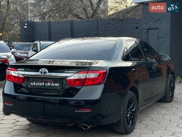 Черный Тойота Камри, объемом двигателя 2.49 л и пробегом 216 тыс. км за 13999 $, фото 7 на Automoto.ua