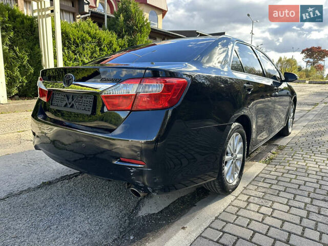Черный Тойота Камри, объемом двигателя 2.5 л и пробегом 175 тыс. км за 9850 $, фото 11 на Automoto.ua
