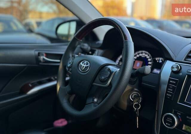 Черный Тойота Камри, объемом двигателя 2.5 л и пробегом 235 тыс. км за 16500 $, фото 23 на Automoto.ua