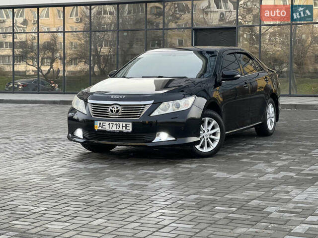 Черный Тойота Камри, объемом двигателя 2.49 л и пробегом 175 тыс. км за 12800 $, фото 1 на Automoto.ua