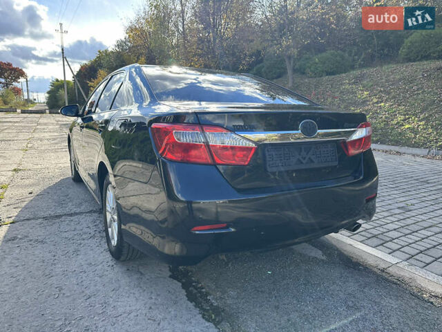 Черный Тойота Камри, объемом двигателя 2.5 л и пробегом 175 тыс. км за 9850 $, фото 10 на Automoto.ua