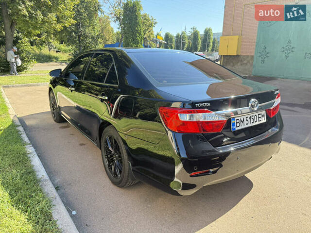 Черный Тойота Камри, объемом двигателя 2.49 л и пробегом 164 тыс. км за 14000 $, фото 2 на Automoto.ua