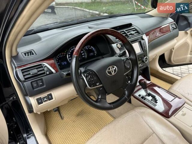 Черный Тойота Камри, объемом двигателя 2.49 л и пробегом 200 тыс. км за 10000 $, фото 42 на Automoto.ua