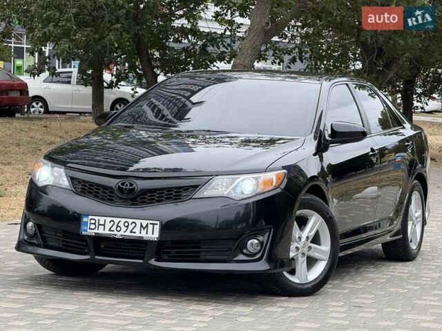 Черный Тойота Камри, объемом двигателя 2.5 л и пробегом 196 тыс. км за 13600 $, фото 11 на Automoto.ua