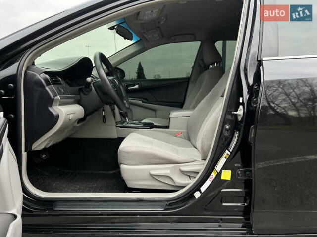 Чорний Тойота Камрі, об'ємом двигуна 2.49 л та пробігом 199 тис. км за 10999 $, фото 30 на Automoto.ua