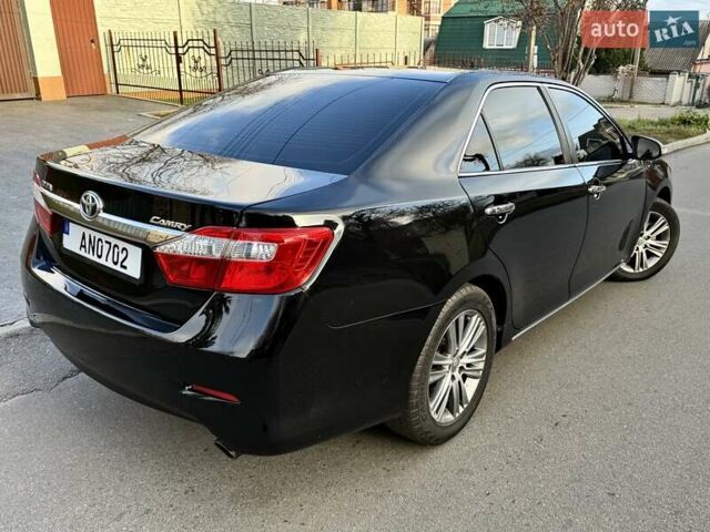 Чорний Тойота Камрі, об'ємом двигуна 2.49 л та пробігом 185 тис. км за 12000 $, фото 22 на Automoto.ua