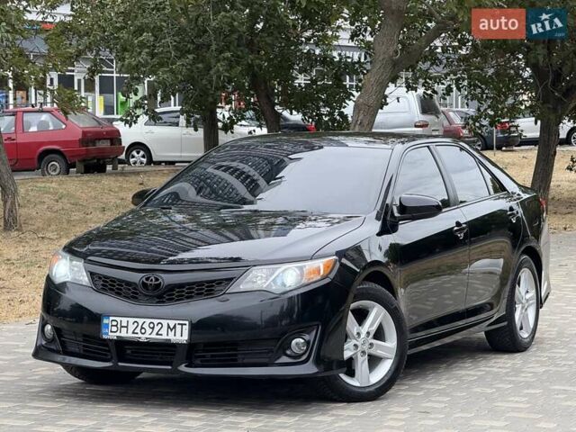 Черный Тойота Камри, объемом двигателя 2.5 л и пробегом 196 тыс. км за 13600 $, фото 15 на Automoto.ua