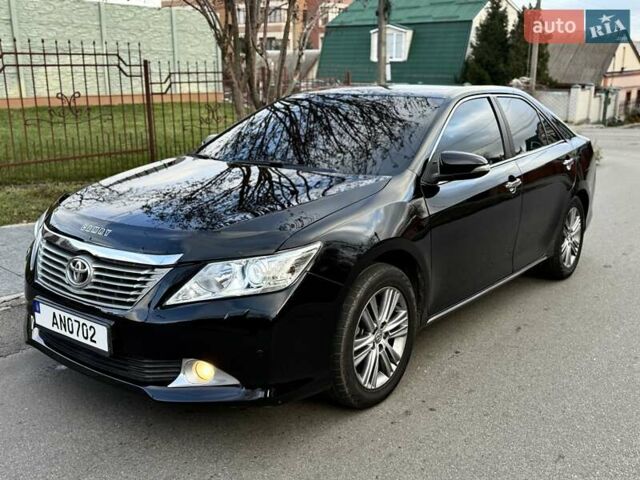 Чорний Тойота Камрі, об'ємом двигуна 2.49 л та пробігом 185 тис. км за 12000 $, фото 1 на Automoto.ua