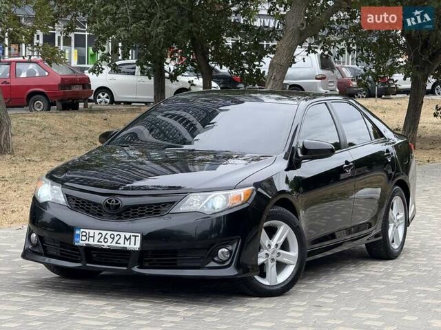Черный Тойота Камри, объемом двигателя 2.5 л и пробегом 196 тыс. км за 13600 $, фото 13 на Automoto.ua