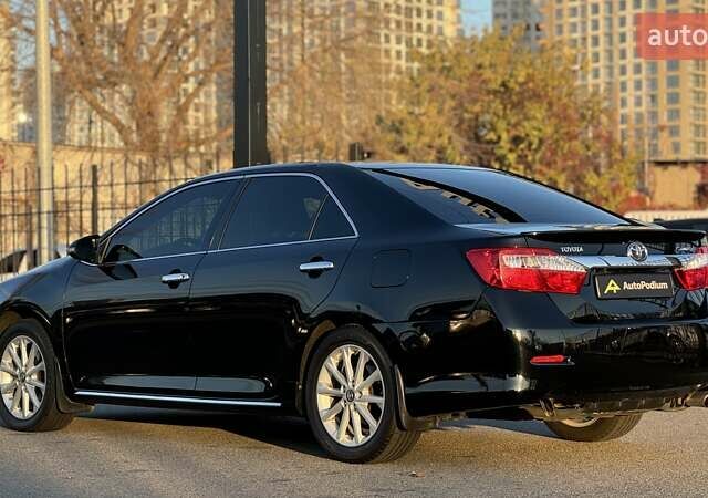 Черный Тойота Камри, объемом двигателя 2.5 л и пробегом 235 тыс. км за 16500 $, фото 4 на Automoto.ua
