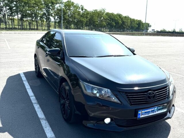 Черный Тойота Камри, объемом двигателя 2.5 л и пробегом 244 тыс. км за 14500 $, фото 3 на Automoto.ua