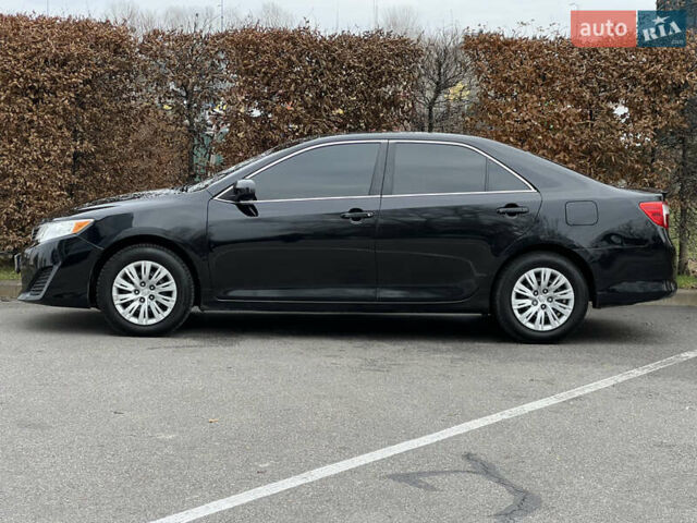 Чорний Тойота Камрі, об'ємом двигуна 2.49 л та пробігом 199 тис. км за 10999 $, фото 10 на Automoto.ua