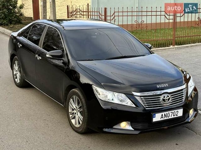 Чорний Тойота Камрі, об'ємом двигуна 2.49 л та пробігом 185 тис. км за 12000 $, фото 19 на Automoto.ua