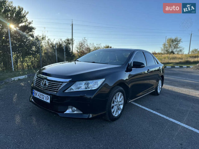 Чорний Тойота Камрі, об'ємом двигуна 2.5 л та пробігом 188 тис. км за 12900 $, фото 1 на Automoto.ua