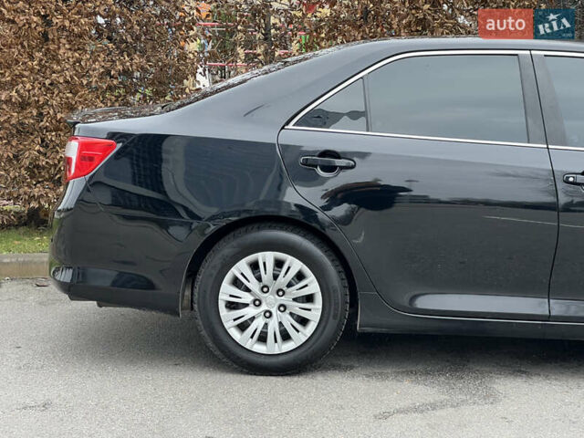Чорний Тойота Камрі, об'ємом двигуна 2.49 л та пробігом 199 тис. км за 10999 $, фото 24 на Automoto.ua