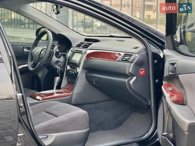 Черный Тойота Камри, объемом двигателя 2.49 л и пробегом 175 тыс. км за 12800 $, фото 25 на Automoto.ua