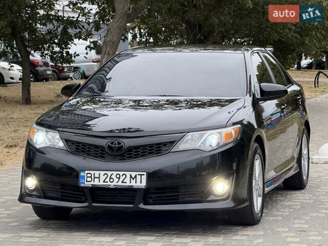 Черный Тойота Камри, объемом двигателя 2.5 л и пробегом 196 тыс. км за 13600 $, фото 2 на Automoto.ua