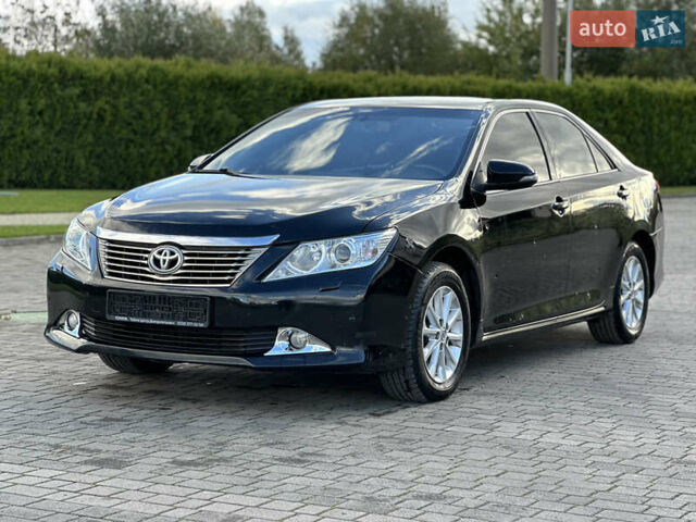 Черный Тойота Камри, объемом двигателя 2.5 л и пробегом 175 тыс. км за 9850 $, фото 6 на Automoto.ua