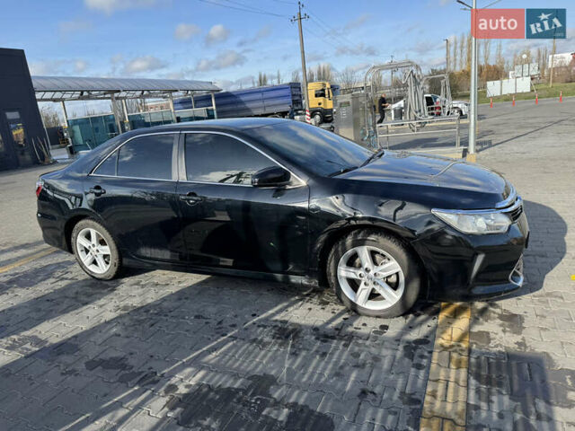 Черный Тойота Камри, объемом двигателя 2.49 л и пробегом 142 тыс. км за 13200 $, фото 10 на Automoto.ua