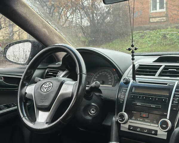 Черный Тойота Камри, объемом двигателя 2.49 л и пробегом 220 тыс. км за 7599 $, фото 5 на Automoto.ua