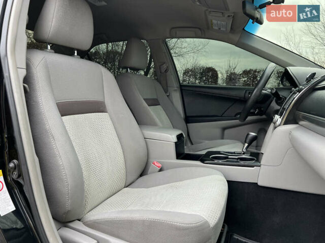 Чорний Тойота Камрі, об'ємом двигуна 2.49 л та пробігом 199 тис. км за 10999 $, фото 50 на Automoto.ua