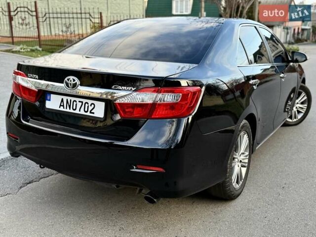 Чорний Тойота Камрі, об'ємом двигуна 2.49 л та пробігом 185 тис. км за 12000 $, фото 23 на Automoto.ua