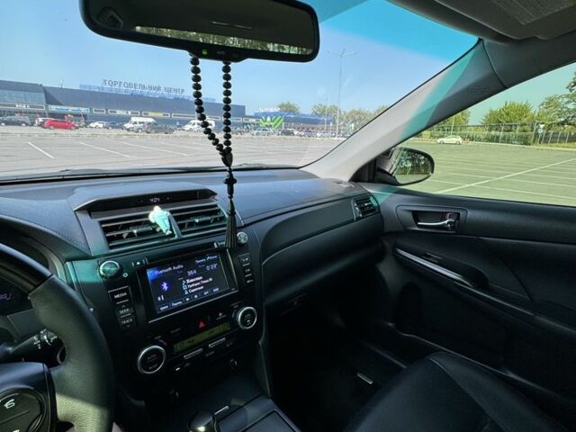 Черный Тойота Камри, объемом двигателя 2.5 л и пробегом 244 тыс. км за 14500 $, фото 17 на Automoto.ua