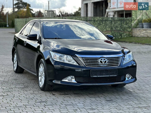 Черный Тойота Камри, объемом двигателя 2.5 л и пробегом 175 тыс. км за 9850 $, фото 9 на Automoto.ua