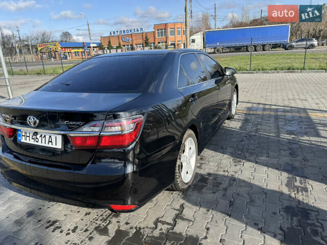 Черный Тойота Камри, объемом двигателя 2.49 л и пробегом 142 тыс. км за 13200 $, фото 7 на Automoto.ua