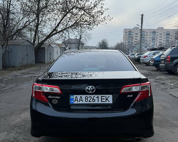 Чорний Тойота Камрі, об'ємом двигуна 2.49 л та пробігом 179 тис. км за 10900 $, фото 4 на Automoto.ua