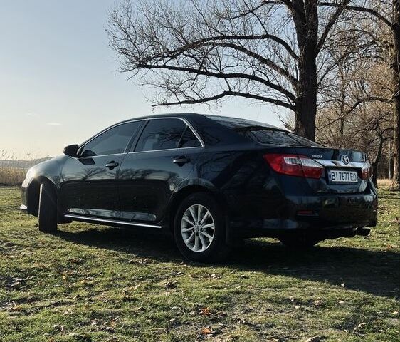 Черный Тойота Камри, объемом двигателя 2.5 л и пробегом 280 тыс. км за 12100 $, фото 10 на Automoto.ua