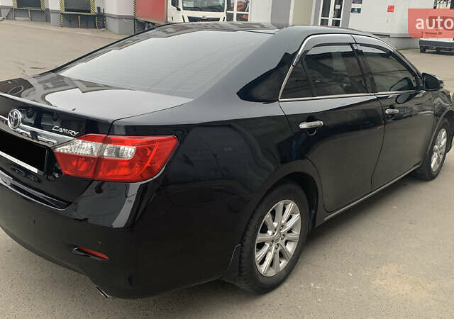 Чорний Тойота Камрі, об'ємом двигуна 2.5 л та пробігом 124 тис. км за 14700 $, фото 3 на Automoto.ua