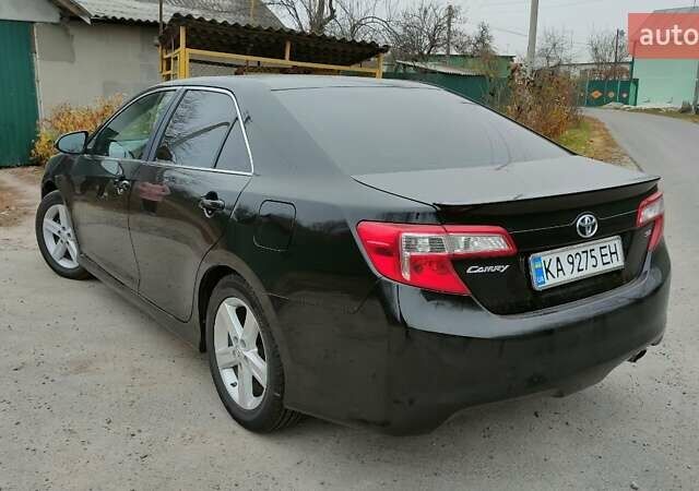 Черный Тойота Камри, объемом двигателя 2.5 л и пробегом 370 тыс. км за 9600 $, фото 1 на Automoto.ua