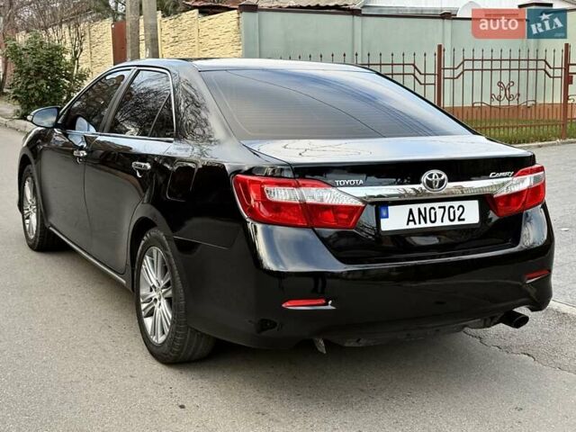 Чорний Тойота Камрі, об'ємом двигуна 2.49 л та пробігом 185 тис. км за 12000 $, фото 16 на Automoto.ua