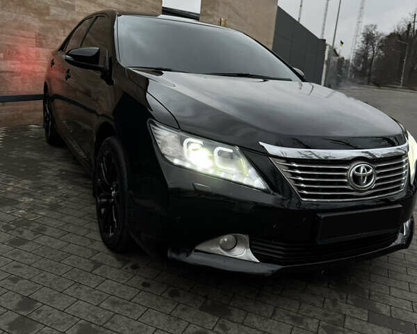 Черный Тойота Камри, объемом двигателя 2.49 л и пробегом 193 тыс. км за 15300 $, фото 2 на Automoto.ua