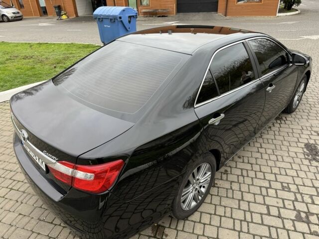 Черный Тойота Камри, объемом двигателя 2.5 л и пробегом 200 тыс. км за 9900 $, фото 7 на Automoto.ua