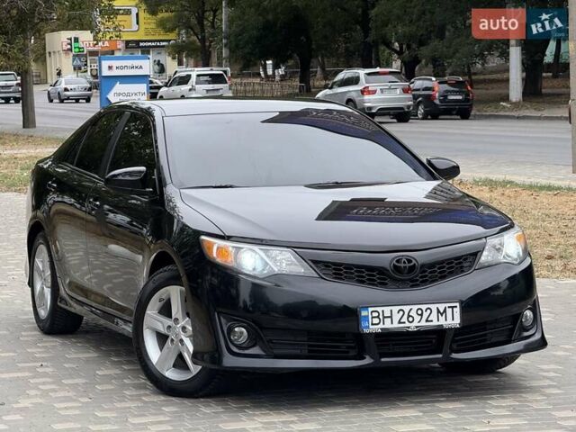 Черный Тойота Камри, объемом двигателя 2.5 л и пробегом 196 тыс. км за 13600 $, фото 26 на Automoto.ua